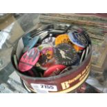 Tin of badges and buttons incl. 80s bands
