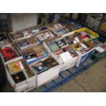 Bay containing 18 boxes of CDs incl. Elviss, Razor Light, Lou Reed, Elvis, Tom Robinson, etc.