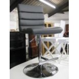 Grey faux leather upholstered rotating chrome base bar stool
