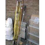 Rotating clothes line, broom, garden rake and garden chair