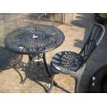 Small metal garden table with chair