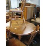 Pine extending kitchen table with set of 4 spindle back chairs