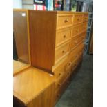 Teak bedroom suite comprising chest of 2 over 2 drawers, bedside unit of 3 drawers, chest of 3