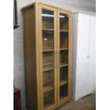 Oak glazed double door cabinet