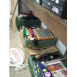 Bay containing 10 boxes of mixed housewares and ceramics incl. games, metalwares, dinner plates,