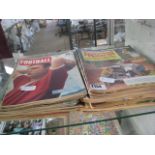 Quantity of motoring annuals and football magazines