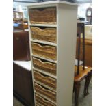 Cream cabinet with wicker drawers
