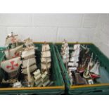 2 crates of wooden ship models