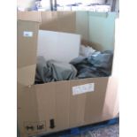 Pallet box containing Coleman Octagon tent parts with some poles and tarpaulin