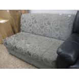 Grey upholstered sofa bed