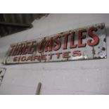 Enamelled metal sign advertising Three Castles cigarettes