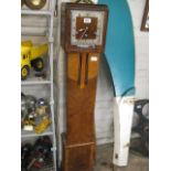 Wooden cased grandmother clock, presented to Mt T. Horridge by Messrs Homfray & Co. Ltd.