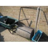 Plastic wheelbarrow, garden roller and seed spreader