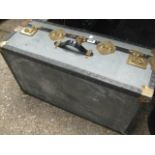 Grey and black twin handled travel trunk