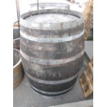 Large wooden metal banded wine barrel