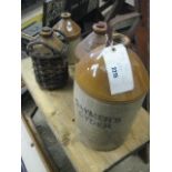 Gaymer's cider jug, Huntingdon breweries jug, a Manchester wine jug, and a Marshall Bros. wine