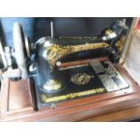 Cased Victorian sewing machine by Singer