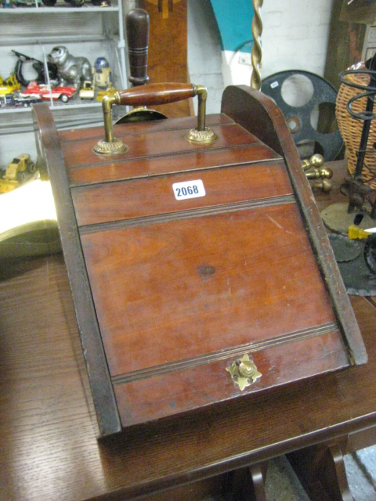 Mahogany coal scuttle with brass shovel