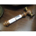 Wooden and brass gavel