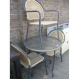 Small glass topped wicker and metal garden table with 3 chairs