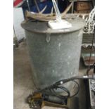 Large cylindrical galvanised lidded container