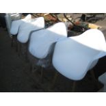 Set of 4 white plastic and wooden garden chairs