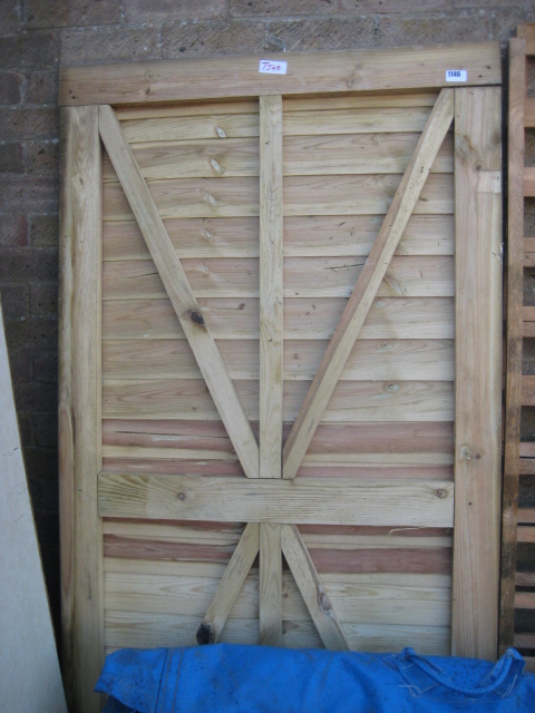 Large wooden garden gate