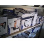 Shelf containing a large quantity of various LAP security lights
