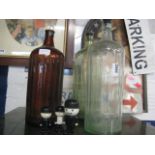 3 large poison bottles and Homepride salt & pepper shakers