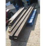 Pallet containing various length wooden decking