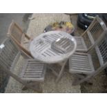 Small childs garden table and 4 chairs
