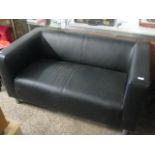 Modern black leatherette upholstered 2 seater sofa