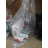 Bag of various battery packs and other accessories