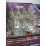 Crate of various branded glasses