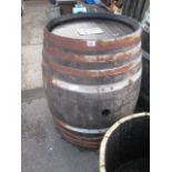 Wooden and metal banded wine barrel