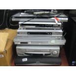 (38) Stack of audio visual equipment incl. LG DVD player, Maxim DVD player, LG VHS, pansonic DVD