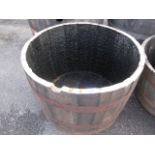 (1161) Half whiskey barrel planter