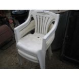 4 white plastic garden chairs