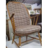 Ash and elm Ercol spindle back armchair with brown and beige cushion *Collector's Item: Sold in