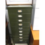 Green metal multi drawer filing cabinet