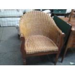 Cane tub chair on wooden frame
