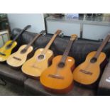 5 various acoustic guitars