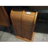 Tambour fronted CD storage unit