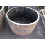 Half whiskey barrel planter