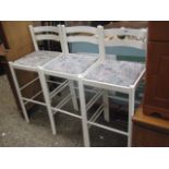 3 white bar height stools