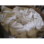 Shallow pallet of white towels