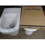 2 toilet pans and boxed seat