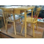 Mid century ash single drawer childs desk with 2 stick back chairs