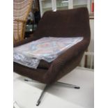 Brown corduroy upholstered swivel easy chair on 4 star chrome base