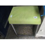 Green upholstered stool on chrome base